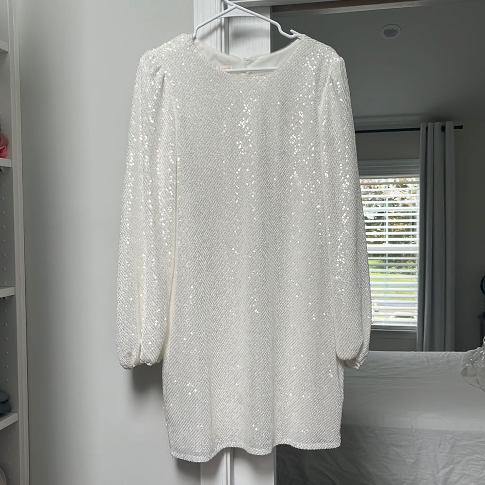 White jenny too wedding worn for after wedding party.